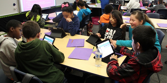 Students at David Weir Elementary School in Fairfield complete a lesson on their tablets.